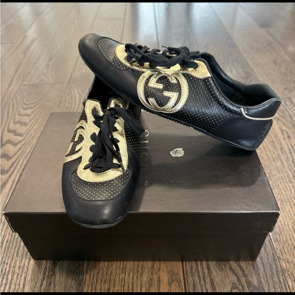 Authentic Gucci Black and Gold Sneakers